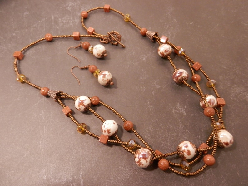 Multistrand Goldstone Necklace with Brown /& White Ceramic Bronze Glass AB Faceted Crystals Antique Copper Accents and Matching Earrings