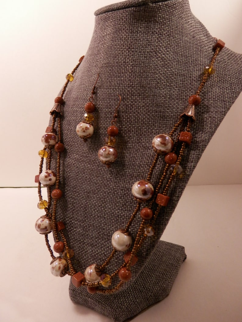 Multistrand Goldstone Necklace with Brown /& White Ceramic Bronze Glass AB Faceted Crystals Antique Copper Accents and Matching Earrings