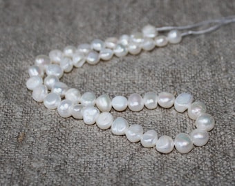 Freshwater pearls, cultured pearls, 9 mm, stranded, length 35 cm