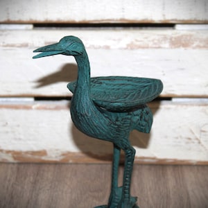 Bird bath, bird food bowl, standing stork, cast iron