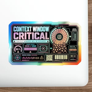 May include: A rectangular holographic sticker featuring a black interface with the text CONTEXT WINDOW CRITICAL and EARLIEST MEMORIES WILL BE DISCARDED. The design includes a circular data visualisation, a progress bar at 99.7%, and a barcode.
