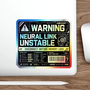 May include: A holographic sticker with a warning about an unstable neural link. The sticker features the text "WARNING NEURAL LINK UNSTABLE" and technical data, including a serial number and system status indicators. The sticker is on a white surface.