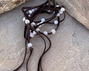 Dark brown leather lariat and pearl necklace