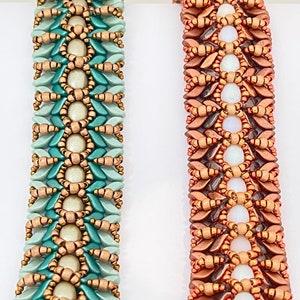 May include: Two beaded bracelets, one in shades of teal and copper, the other in shades of copper and white.