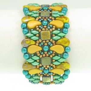 May include: A beaded bracelet with a geometric pattern in shades of teal, green, and yellow.