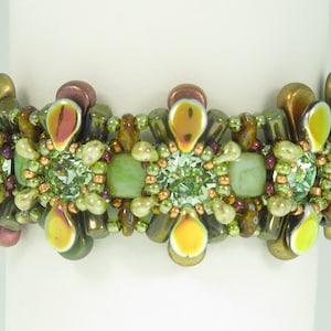 May include: A green, brown and gold beaded bracelet with a floral design. The bracelet is made with various sizes and shapes of beads, including round, square and teardrop-shaped beads.