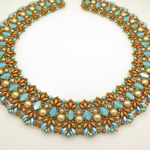 May include: A gold and turquoise beaded necklace with a geometric pattern. The necklace is made with small seed beads and larger round beads.