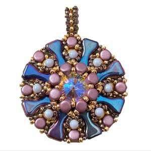 May include: A round pendant with a blue, purple and gold iridescent finish. The pendant is made of beads and features a clear crystal in the centre.
