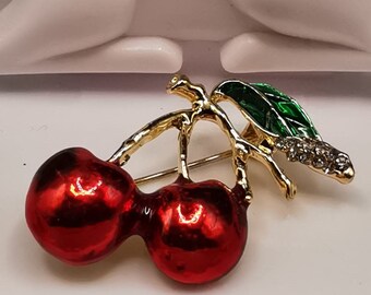 Brooch with cherries.