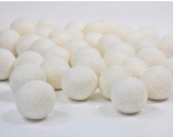 Listing for Dawn. (125 3-3.3 cm white wool felt bolls)