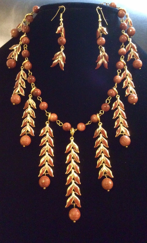 A statement necklace and earring set to wear at a special Etsy