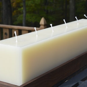 IN STOCK ivory candle with 6 wicks.  Ships in one business day.