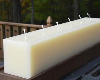 IN STOCK ivory candle with 6 wicks.  Ships in one business day.