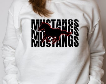 May include: White sweatshirt with a black silhouette of a running horse and the word "Mustangs" repeated three times in black text.
