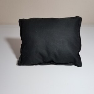 Black small pillow