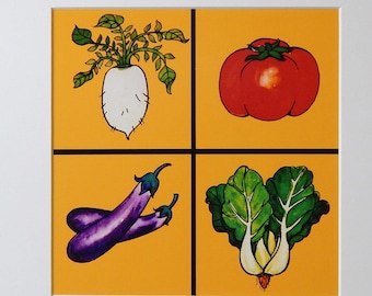 May include: A framed print with a yellow background divided into four squares. Each square features a different vegetable: a white radish, a red tomato, a purple eggplant, and a green leafy vegetable.