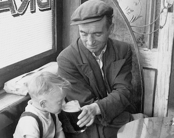 Father and Son in Dublin Pub – black and white photograph, by Marvin Koner, 1959