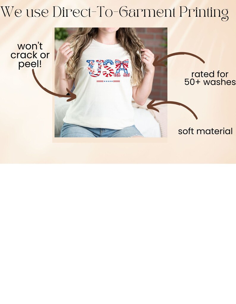 May include: A white t-shirt with a red, white, and blue USA graphic featuring a bow. The graphic is made up of flowers and stars. The shirt is made with a soft material and is rated for 50+ washes.
