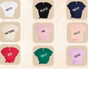 May include: Color chart showing different t-shirt colors, including white, black, navy, natural, pink, peach, red, kelly green, and lilac.
