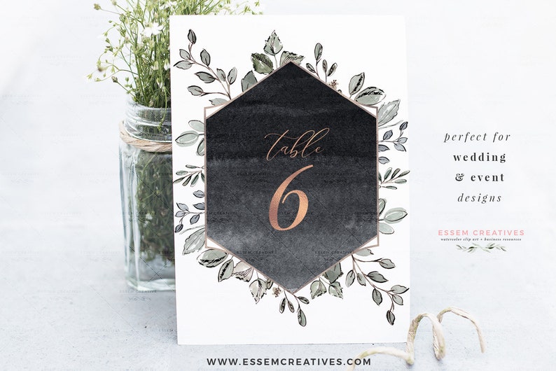 May include: A black and white watercolor table number card with a gold hexagonal frame and greenery. The number 6 is written in gold on the card. The text "table" is written in cursive above the number. The card is perfect for a wedding or event.