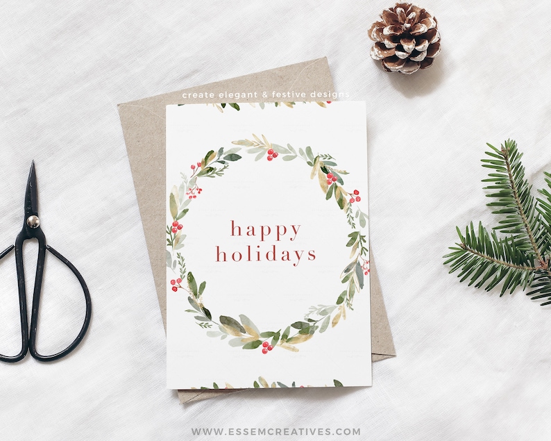 May include: A white card with a green watercolor wreath with red berries and the text "happy holidays" in red.