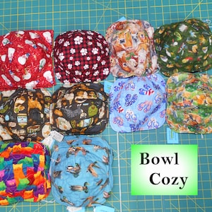 Bowl Cozy-choose one: snowmen paw print/farm animal/flies fishing/cat fish/flip flops/floxs/cats/ducks/bowl holder for hot or cold items
