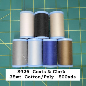 May include: Seven spools of Coats & Clark S926 thread in various colors, including white, black, gray, light blue, dark blue, and brown. Each spool has a blue base and top. The text on the label reads "35wt Cotton/Poly 500yds."