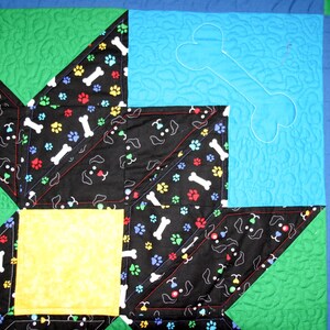 Puppy Dogs & Bones Carpenter Star Baby/Toddler/Lap Quilt 55 x 55 green/blue/yellow/multi colored faces and bones, quilted paw print/bone image 3