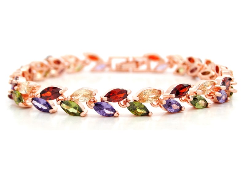 purple bracelet bag black box Authentic rose gold plated bracelet with sparkling rainbow marquise gems surrounding deep green and citrine