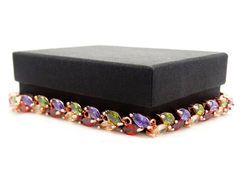 purple bracelet bag black box Authentic rose gold plated bracelet with sparkling rainbow marquise gems surrounding deep green and citrine