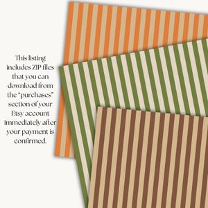 May include: Three sheets of paper with vertical stripes in orange, green, and brown. The stripes alternate with cream-coloured stripes. The paper is slightly angled, creating a layered effect. The text on the left side of the image is blurry.