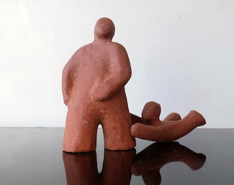 Ceramic sculpture "Сhild holding father's leg", for Psychotherapy and Sand Play