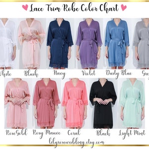 May include: Color chart showing ten different colors of satin robes with lace trim. The colors are white, blush, navy, violet, dusty blue, grey, rose gold, rosy mauve, coral, black, and light mint.