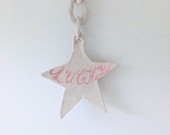 lucky star ceramic wall hanging