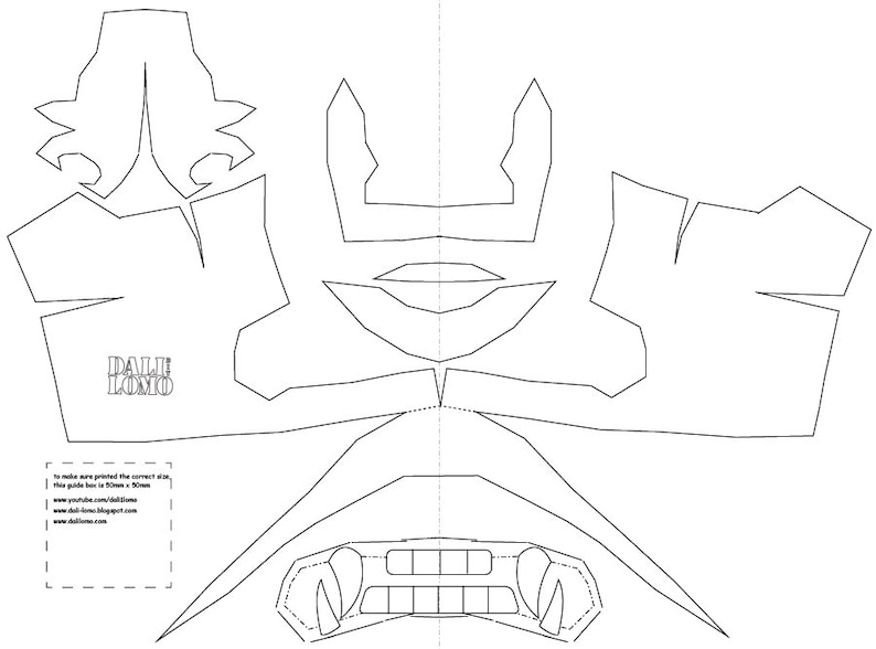 May include: A printable template for a papercraft mask. The mask is designed to look like a monster with sharp teeth and a large, open mouth. The template includes instructions to make sure the printed size is correct.