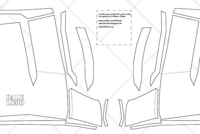 May include: A black and white line drawing of a papercraft model. The model is a pair of boots with a pointed toe and a high heel. The drawing includes instructions for making the model.