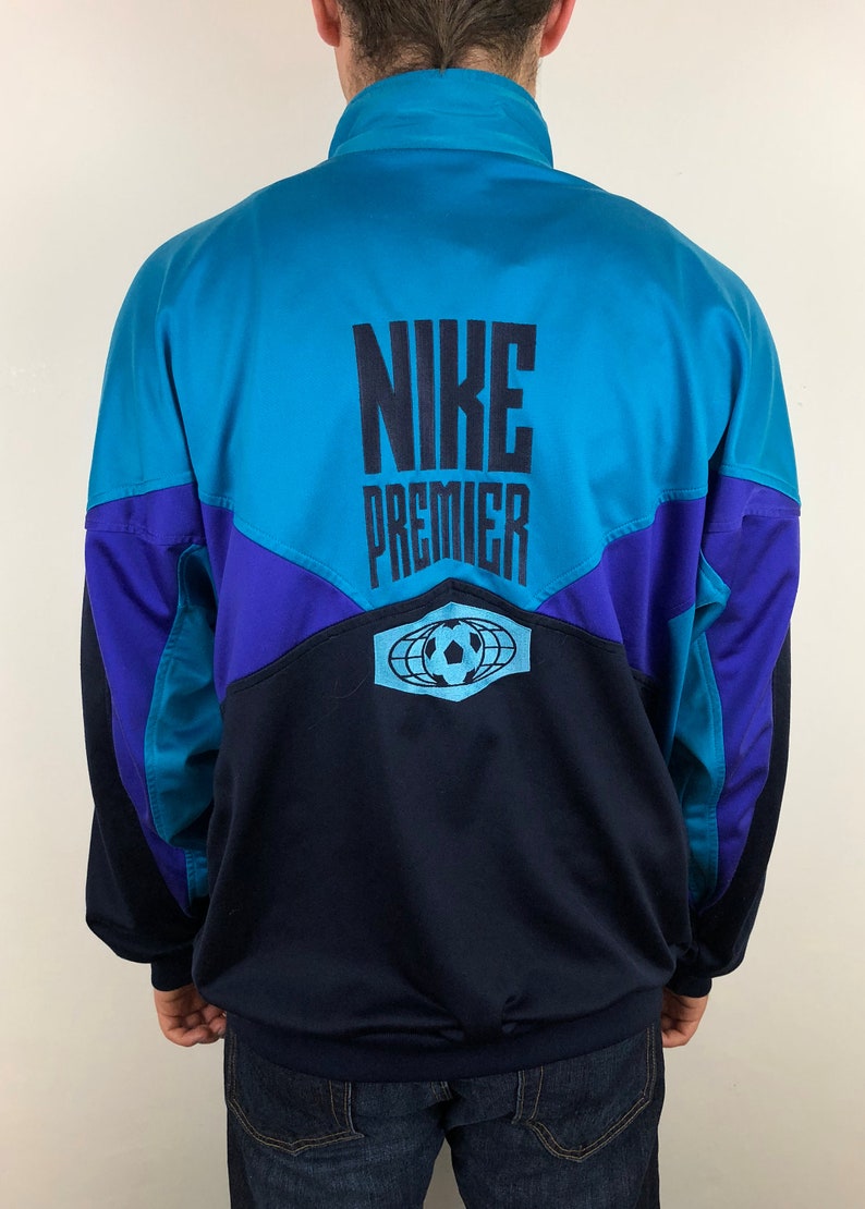 abrigo nike purpura
