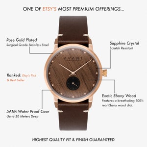 May include: A rose gold plated watch with a brown leather strap and a wooden face. The watch is water resistant up to 50 metres and features a sapphire crystal face. The watch is made with surgical grade stainless steel and has a real ebony wood dial.