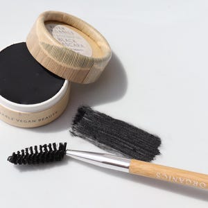 LONG LASH MASCARA in Black made with Clay and toxic-free ingredients in eco-friendly packaging in solid format.