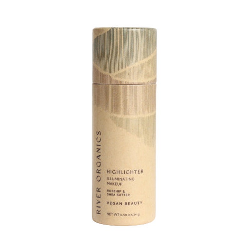 Minimalist sustainable beauty packaging for organic highlighter stick, featuring textured bamboo-inspired design.
