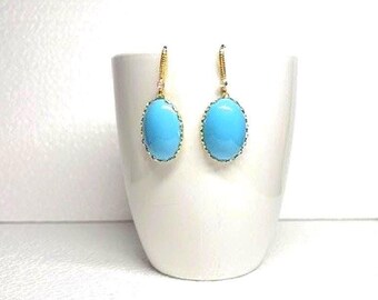 Turquoise Earrings. 18ktk plate ear wire with CZ
