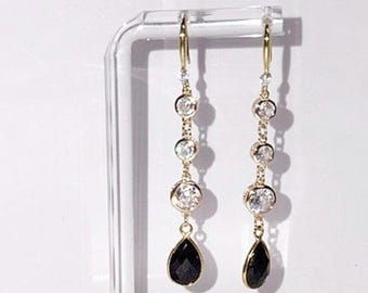 Black Onyx, 3 CZ'S, 18kt plate CZ ear wire.