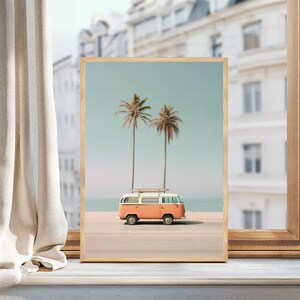 May include: A vintage orange and white van with a surfboard on the roof parked on a beach with two palm trees in the background.