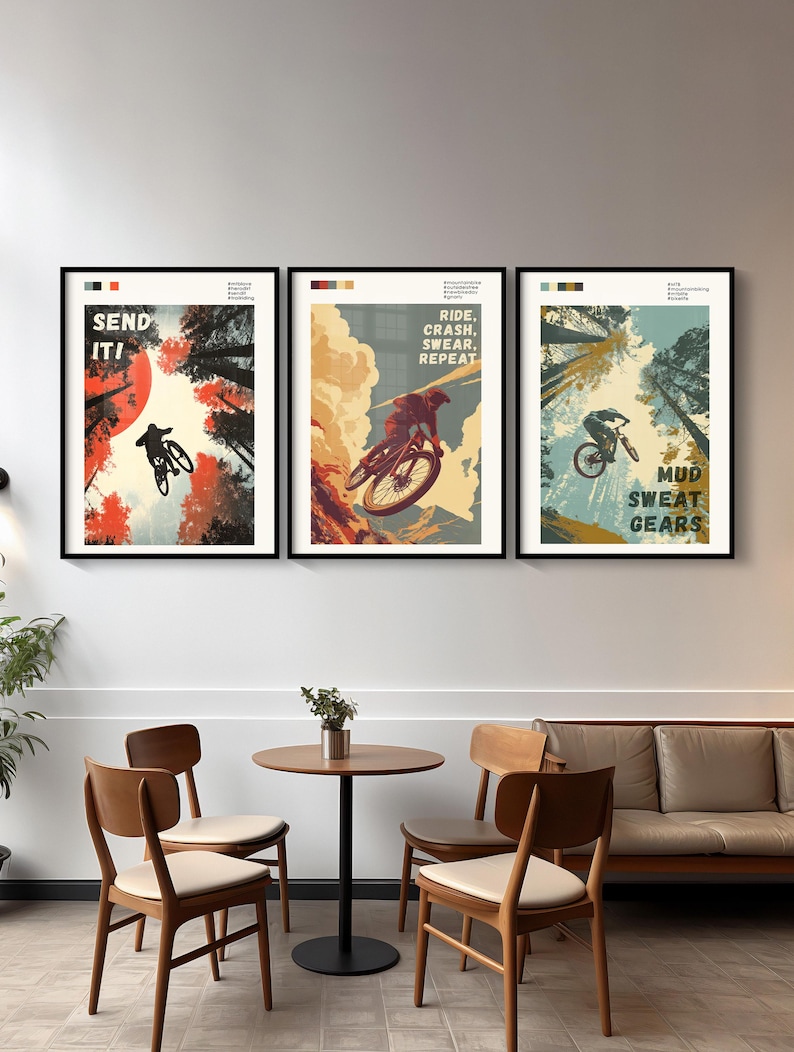 May include: Three framed mountain biking posters. The first poster says "SEND IT!" with a cyclist silhouetted against a red sun. The second poster says "RIDE, CRASH, SWEAR, REPEAT". The third poster says "MUD, SWEAT, GEARS".