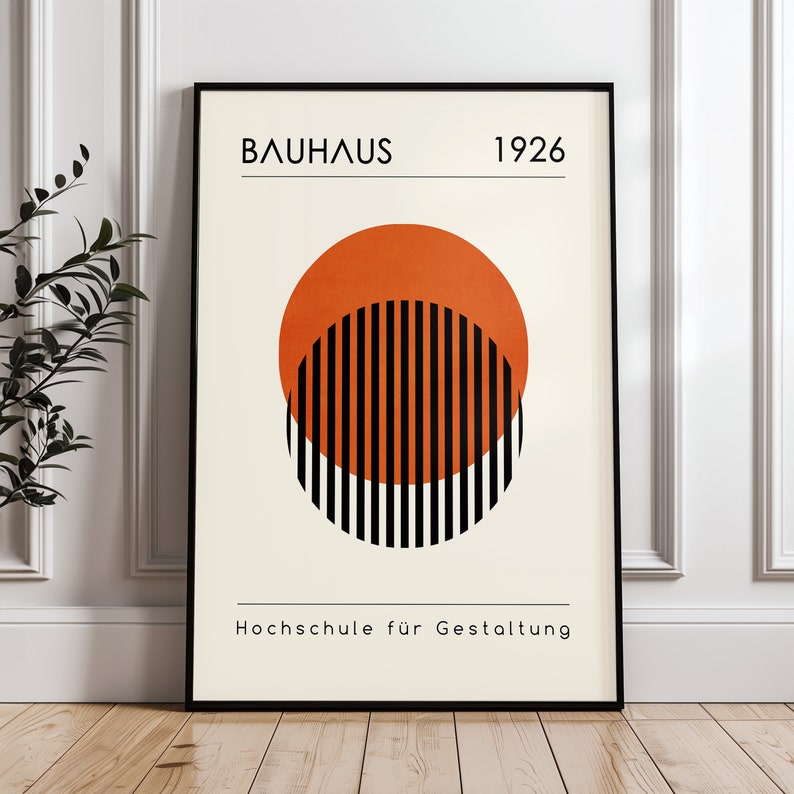 May include: A minimalist poster with the text "BAUHAUS 1926" and "Hochschule f&uuml;r Gestaltung" in black text on a cream background. A large orange circle with black stripes is in the center of the poster.