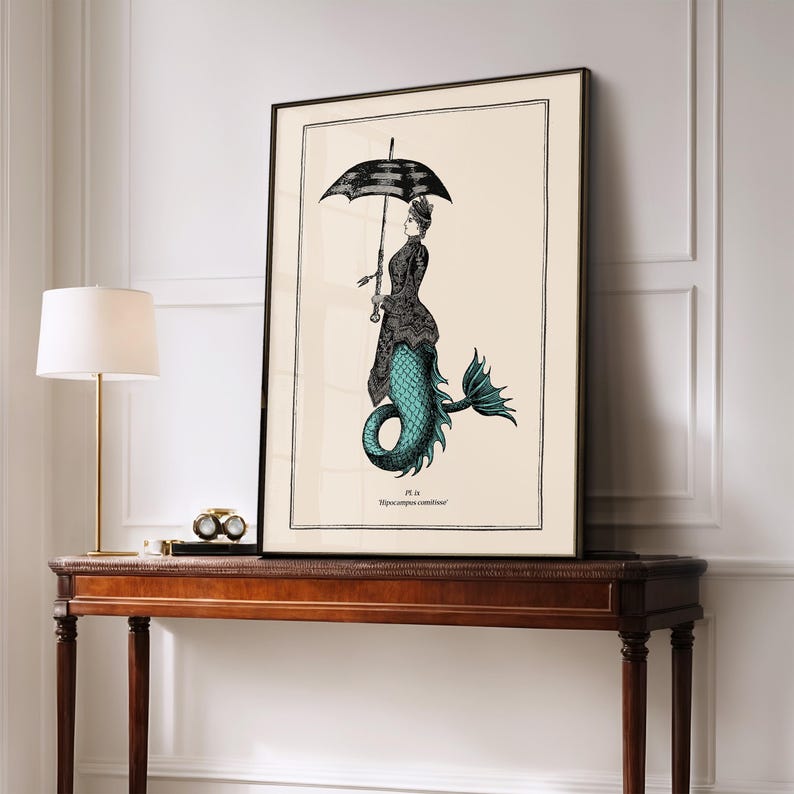 May include: A black and white illustration of a mermaid holding an umbrella. The mermaid is wearing a long dress and has a fishtail. The illustration is on a white background with the text "Pl. 14. Hippocampus comitissae" at the bottom.