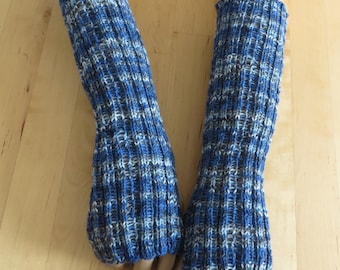 Blue colorful wrist warmers with thumb holes made from Regia sock yarn