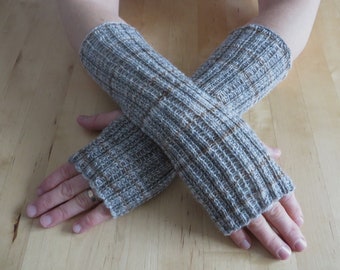 Gray beige wrist warmers hand knitted from Regia sock yarn with thumb hole