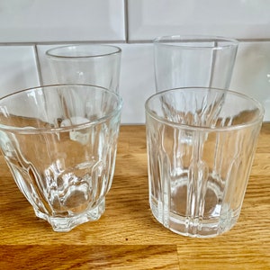Set of 4 vintage or retro water glasses. Mismatched.