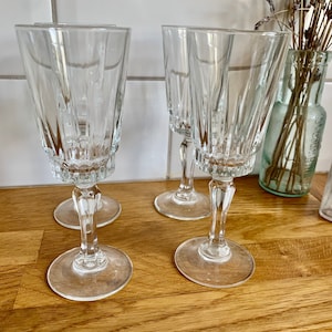 Set of 4 vintage faceted wine glasses.